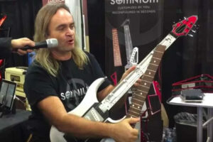 Mark demonstrating guitar neck